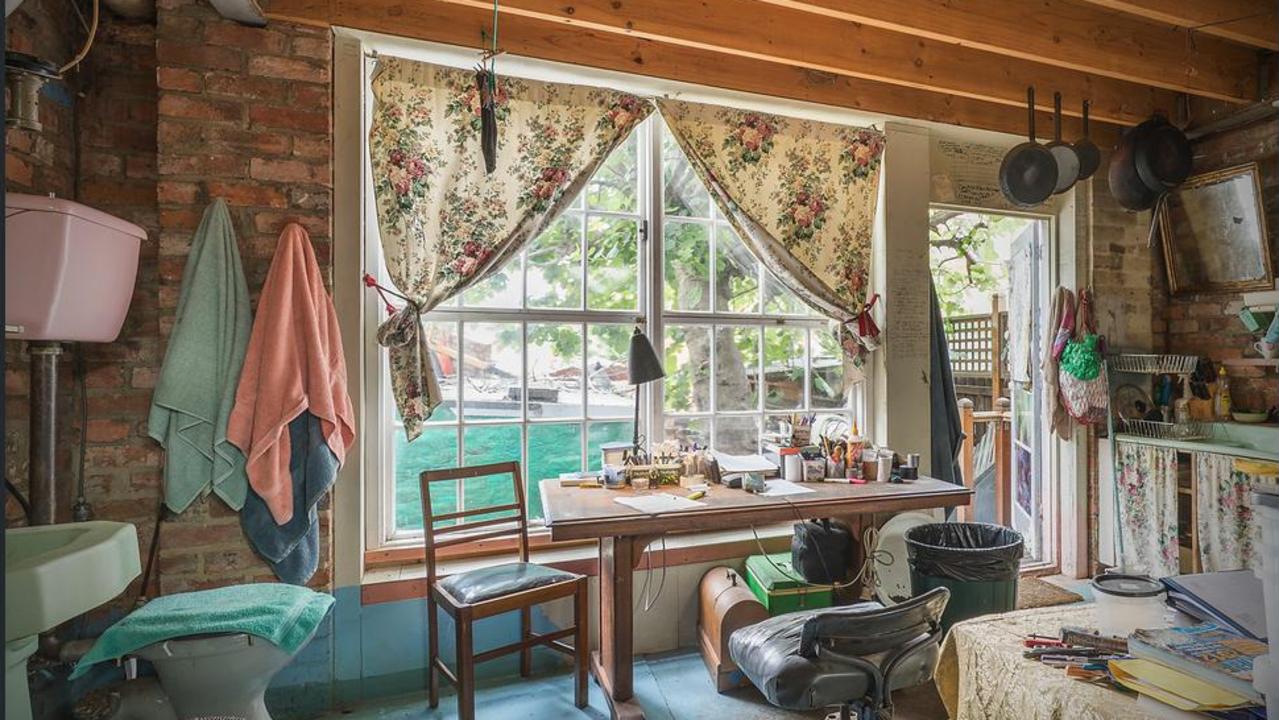 Inside the Fitzroy North property, which had a toilet located in its kitchen.