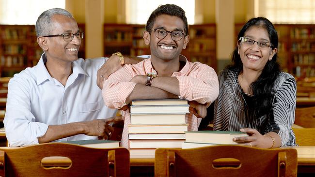 Mahendra Chitrarasu, with his dad Chitrarasu and mother Asha at Adelaide uni. Picture: Naomi Jellicoe