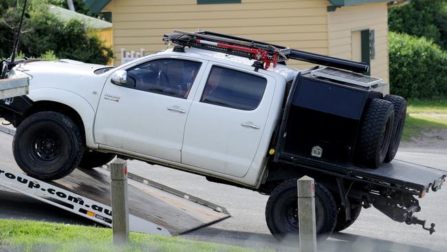 The car belonging to one of the missing fishermen is towed from Flinders. Picture: Andrew Henshaw