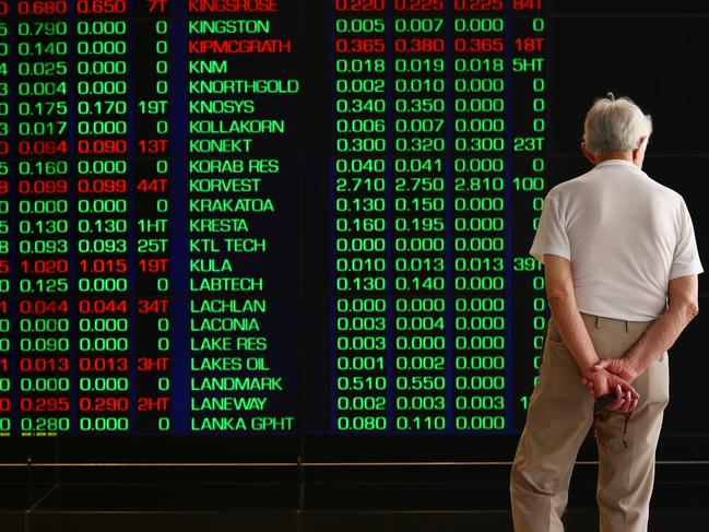 11/01/2016. Investors watch the market indicator boards at the Australian Stock Exchange (ASX) in Sydney. The Australian share market is on the back foot for a sixth straight day as local investors wait anxiously for the start of trade in China. Britta Campion / The Australian.