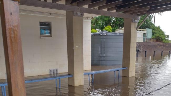 Club members moved furniture from inside the clubhouse to higher ground on Friday.