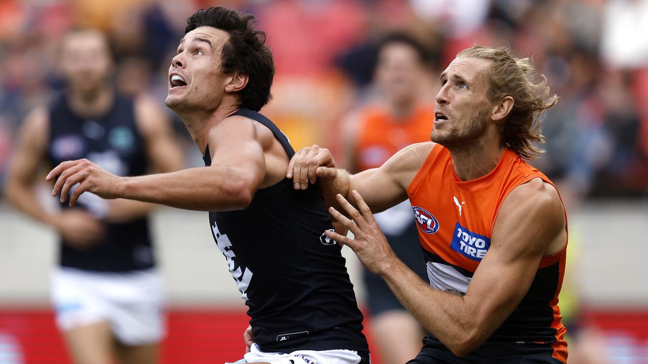 Carlton's Jack Silvagni and Giants Nick Haynes during AFL Round 3 match between the GWS Giants and Carlton Blues at Giants Stadium on April 1, 2023. Photo by Phil Hillyard (Image Supplied for Editorial Use only - **NO ON SALES** - Â©Phil Hillyard )