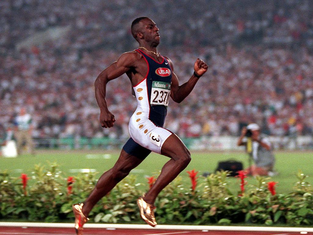 Sprinting legend Michael Johnson is keen to stress patience with the teenager. (AP Photo/Michael Probst)