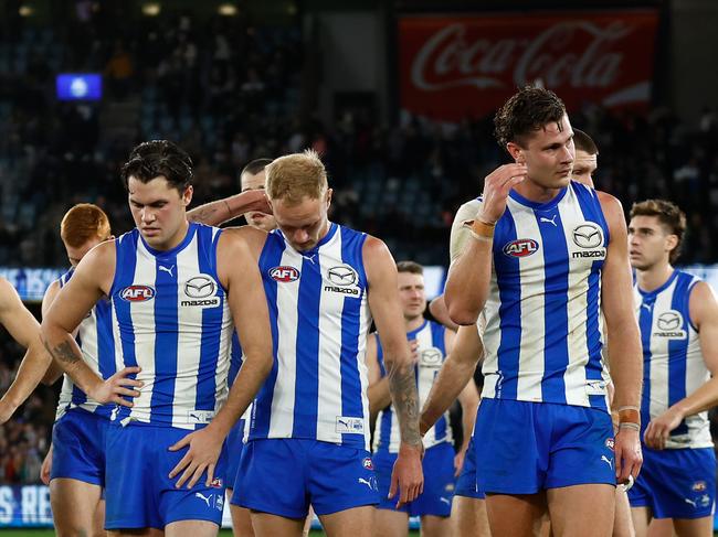 MELBOURNE, AUSTRALIA – JUNE 16: The Kangaroos look dejected after a loss during the 2024 AFL Round 14 match between the North Melbourne Kangaroos and the Collingwood Magpies at Marvel Stadium on June 16, 2024 in Melbourne, Australia. (Photo by Michael Willson/AFL Photos via Getty Images)