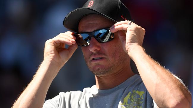 Lleyton Hewitt watches Alex De Minaur’s first-round match at Melbourne Park