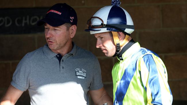Kris Lees and Hugh Bowman talk about Lucia Valentina's Newcastle barrier trial. Picture by Peter Lorimer.