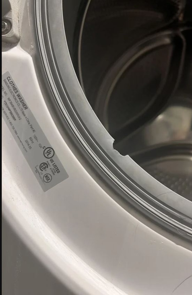 A mother posted a pic of her washing machine which her kid had bitten into. Picture: Reddit