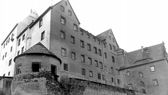 the sheer walls of Colditz Castle used as a POW camp during World War II.