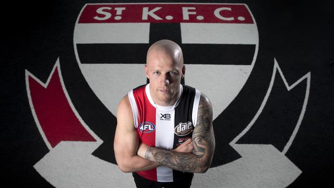 St Kilda recruit Zak Jones tries on his new colours after being traded from Sydney. Picture: Michael Klein