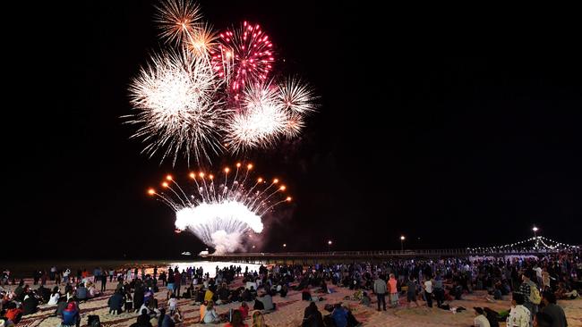 Revellers watch the fireworks on New Year’s Eve in Glenelg. Picture: Tracey Nearmy