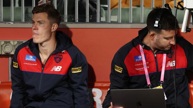 Injured Demon Jake Melksham watches from the bench during the qualifying final against Collingwood. Picture. Michael Klein.