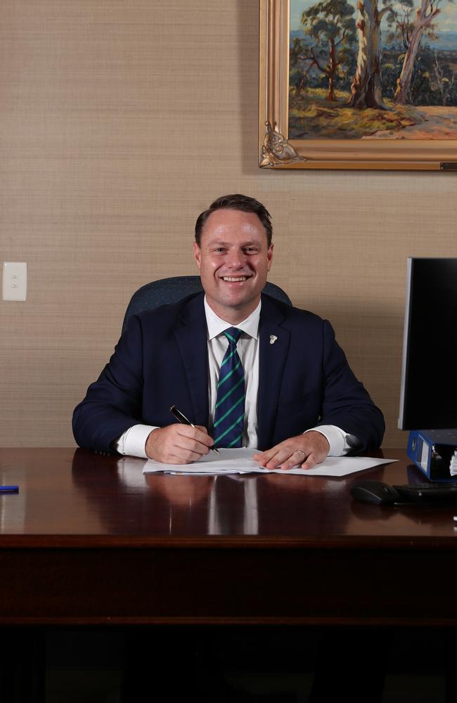 Adrian Schrinner at his Lord Mayoral desk.