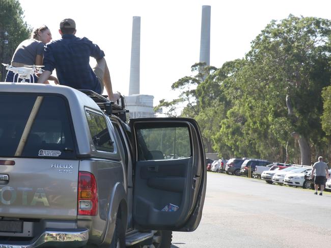 Hundreds turned out to watch the stacks being demolished. Picture: Mark Scott