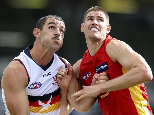 AFL - Adelaide Crows v Gold Coast at Noarlunga Oval.T Taylor Walker contests the boundary throw in with Zac Smith SARAH REED