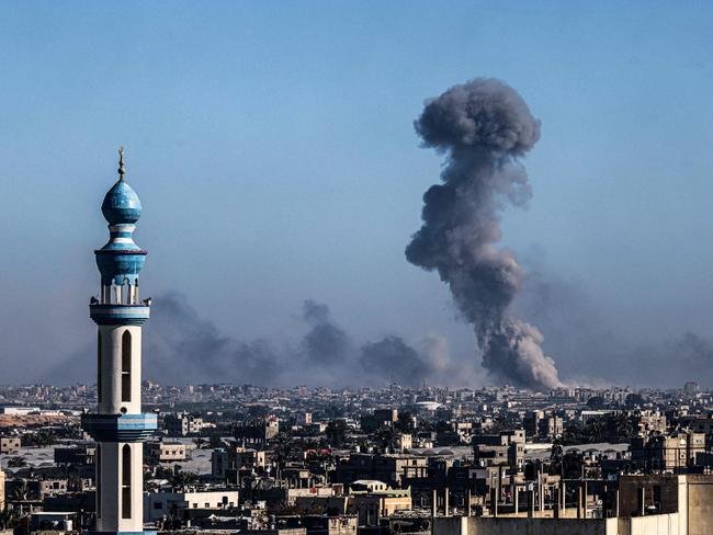 A view from Rafah shows smoke billowing during Israeli bombardment over Khan Younis in the southern Gaza Strip. Picture: AFP