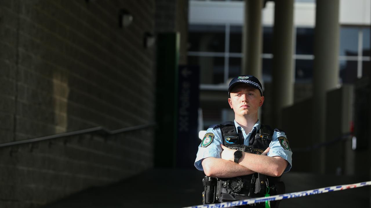 A police officer stands guard outside the station. Picture: NCA NewsWire/ Gaye Gerard