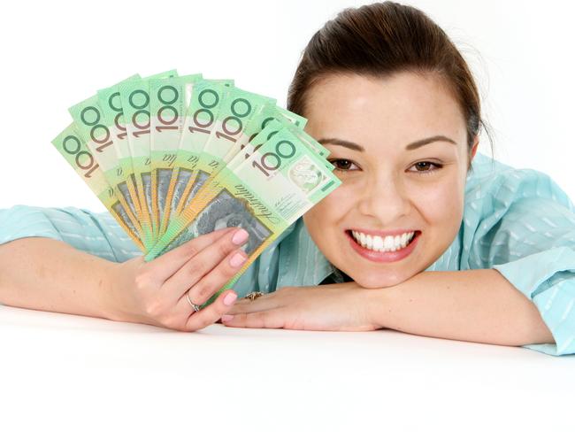 Attractive woman holding lots of Australian Money, generic