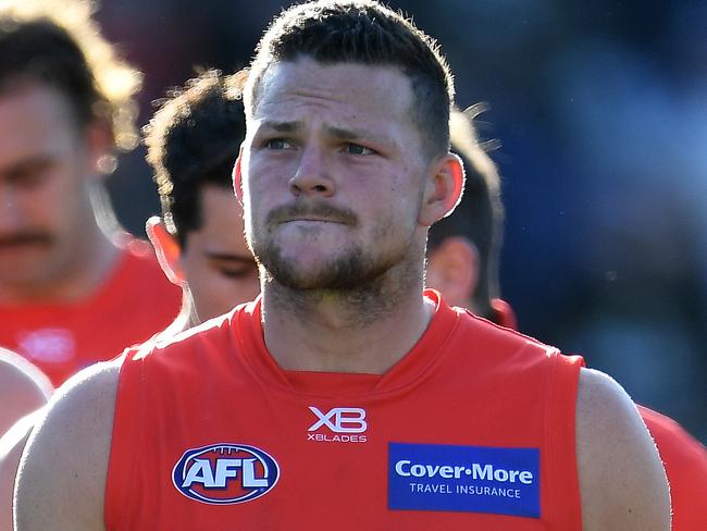 Steven May of the Suns leaves the ground after the Round 23 AFL match between the Geelong Cats and the Gold Coast Suns at GMHBA Stadium in Geelong, Saturday, August 25, 2018. (AAP Image/Julian Smith) NO ARCHIVING, EDITORIAL USE ONLY