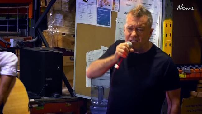 Jimmy Barnes sings 'Working Class Man' at the Harper Collins warehouse