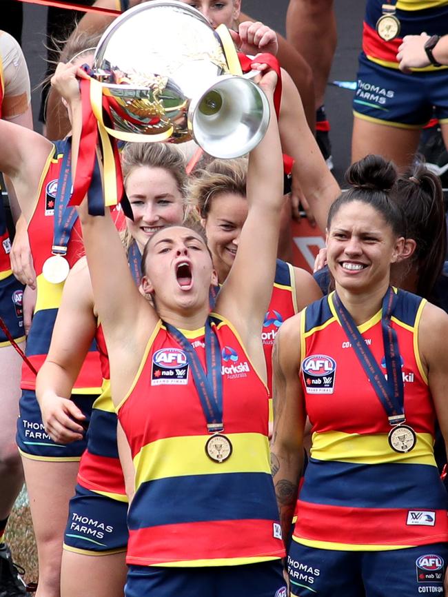 Crows AFLW midfielder Ebony Marinoff celebrating after Adelaide beat Carlton in this year’s grand final Picture: AAP/Kelly Barnes