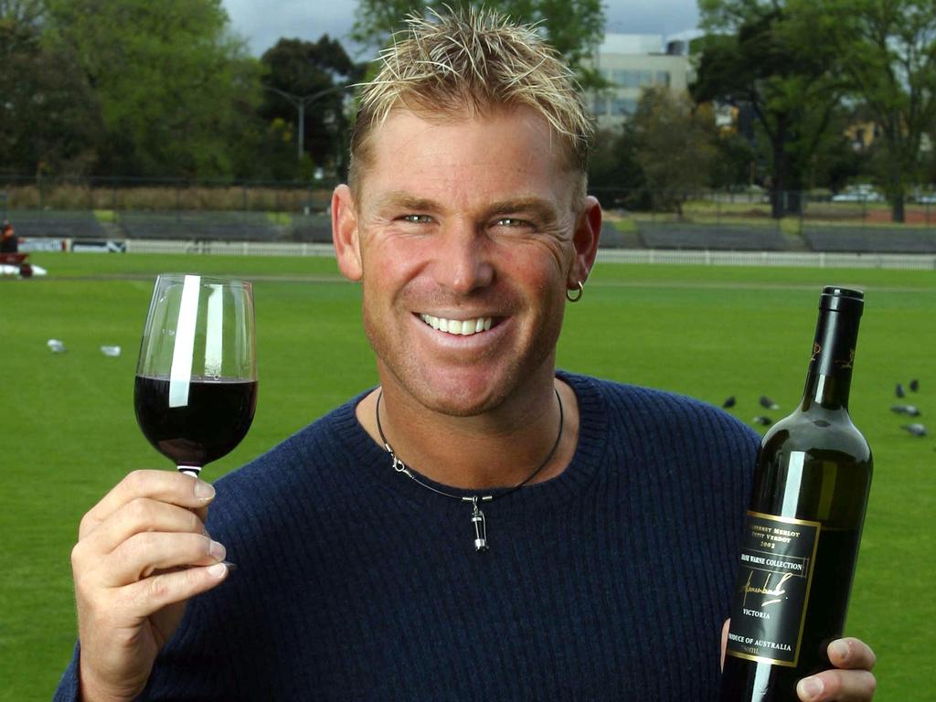 Shane Warne with his SW23 wine. His brother Jason has a bottle that he will open on the anniversary of Shane’s death.