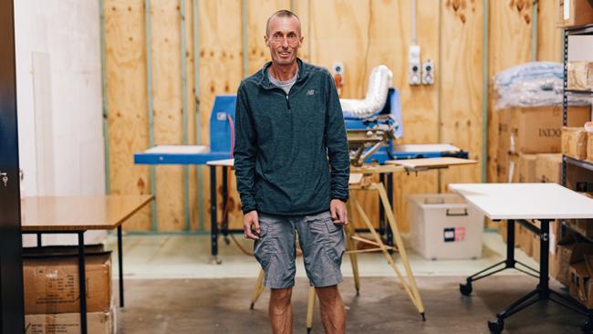 Orange Sky screenprinter Neville Owen in the organisation’s Albion headquarters.