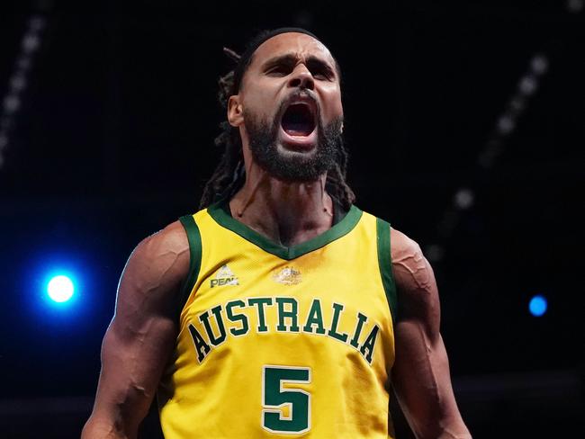 Patty Mills of Australia celebrates after making a basket in the final minutes during match 2 of the Pre-FIBA World Cup series between Australia and the USA  at Marvel Stadium in Melbourne, Saturday, August 24, 2019.  (AAP Image/Scott Barbour) NO ARCHIVING, EDITORIAL USE ONLY