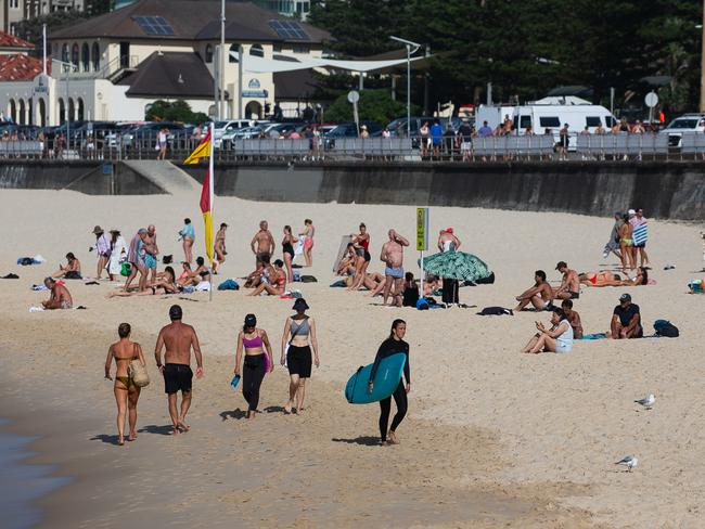 SYDNEY, AUSTRALIA : NewsWire Photos - NOVEMBER 27 2024; People are seen before 8am enjoying the more manageable weather at Bondi Beach as the temperature is reported to climb to 40 degrees today as Sydney braces for another day of extreme heat. Picture: NewsWire / Gaye Gerard