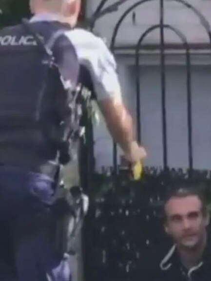 Video shows Bradshaw cornered near a row of terraces. Picture: Supplied