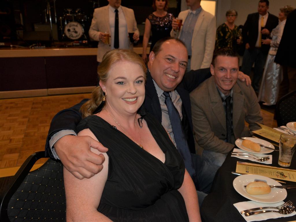 Tegan (L), Aaron and Tim (L) ready for a good night at Warwick's Coppers Ball charity event on Saturday night.