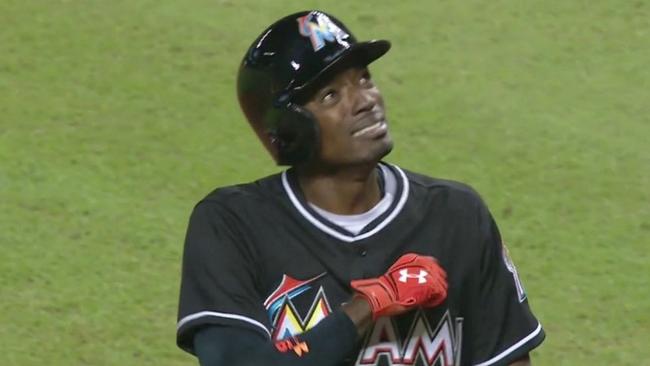 Dee Gordon looks to the sky after a game-opening home run for Miami.