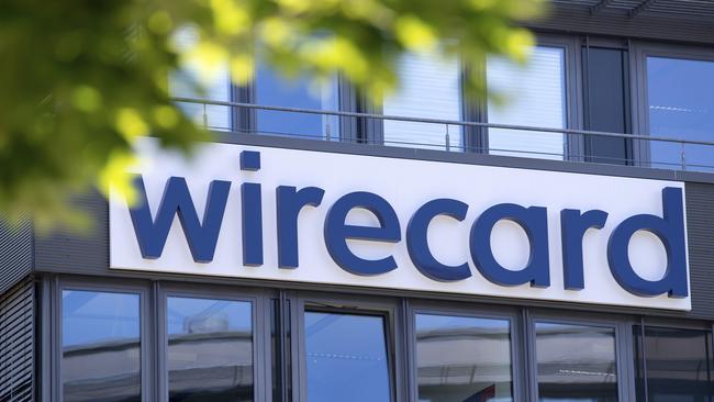 Picture taken June 24, 2020 shows the Wirecard logo at the headquarters of the payment service provider in Aschheim, Germany. (Sven Hoppe/picture-alliance/dpa via AP, file)