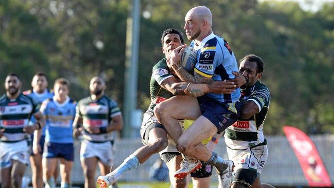 WHO WANTS IT? Ipswich Jets tacklers Michael Purcell and Richard Pandia contest a bomb in last weekend's season-saving victory over Norths at Bishop Park. Picture: Rob Williams