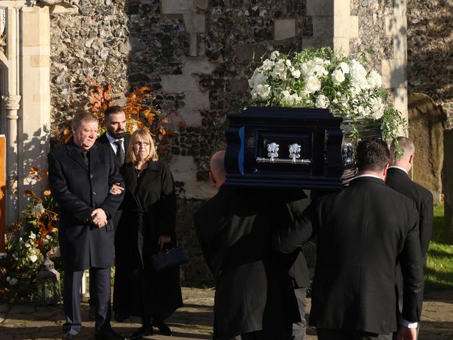 Karen and Geoff Payne watch on as their son’s coffin is brought into the service. Picture: Dan Kitwood/Getty Images