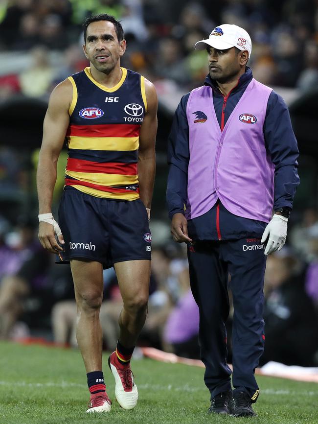 Eddie Betts grabs at his hamstring on the sidelines on Friday night. Picture: Sarah Reed