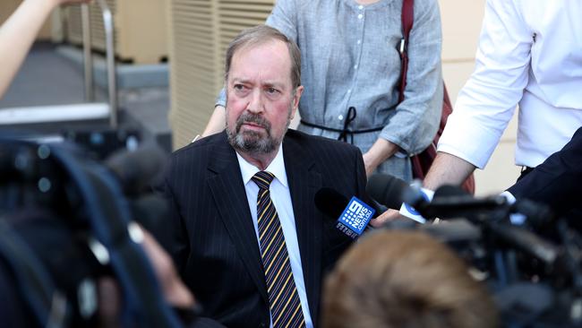 Andrew Knox speaks to the media after Deputy Coroner Anthony Schapel handed down his findings chemo underdosing scandal. Picture: AAP / Kelly Barnes