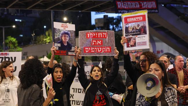 Families of Israeli hostages held by Palestinian militants in the Gaza Strip protest outside the ministry of defence in Tel Aviv. Picture: Ahmad Gharabli/AFP