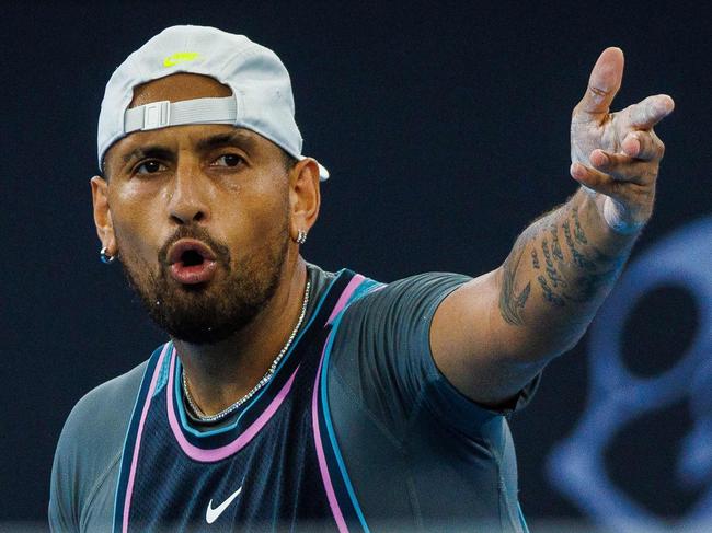 Australiaâs Nick Kyrgios reacts after a point against Franceâs Giovanni Rerricard during their menâs singles match at the Brisbane International tennis tournament in Brisbane on December 31, 2024. (Photo by Patrick HAMILTON / AFP) / -- IMAGE RESTRICTED TO EDITORIAL USE - STRICTLY NO COMMERCIAL USE --