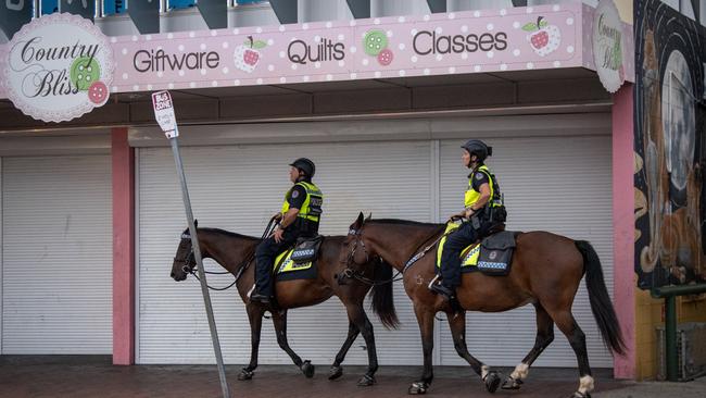 Mounted police patrol the streets of Alice Springs during the night in 2023. Picture Mark Brake