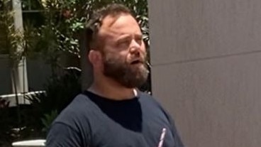 Peter Matthew Dati was seen outside the Maroochydore Police Station eating Hungry Jack's after he was granted bail in the court next door.