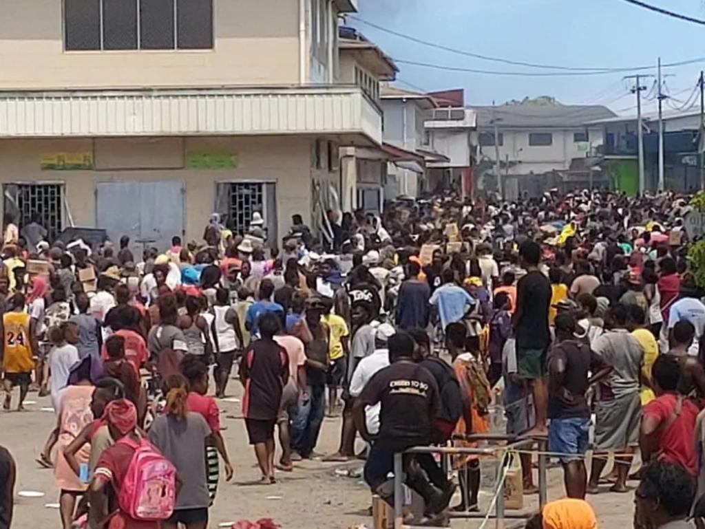 Large crowds are seen in the Solomon Island's capital of Honiara as civil unrest continues for a second day. Picture: Twitter