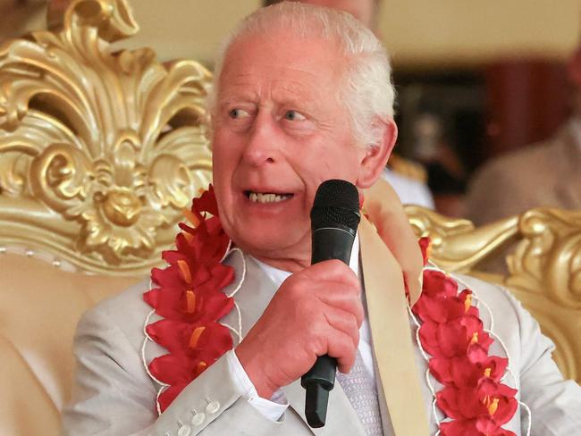 Britain's King Charles III attends the bestowing and farewell ceremony on the final day of the royal visit to Samoa at the Siumu Village in Apia on October 26, 2024. (Photo by MANAUI FAULALO / POOL / AFP)