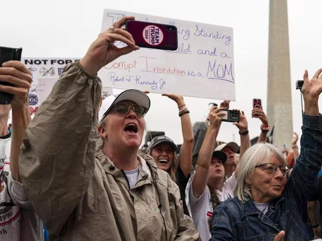 Attendees cheer during the ‘Rescue the Republic’ rally on the National Mall.Picture: Al Drago for WSJ