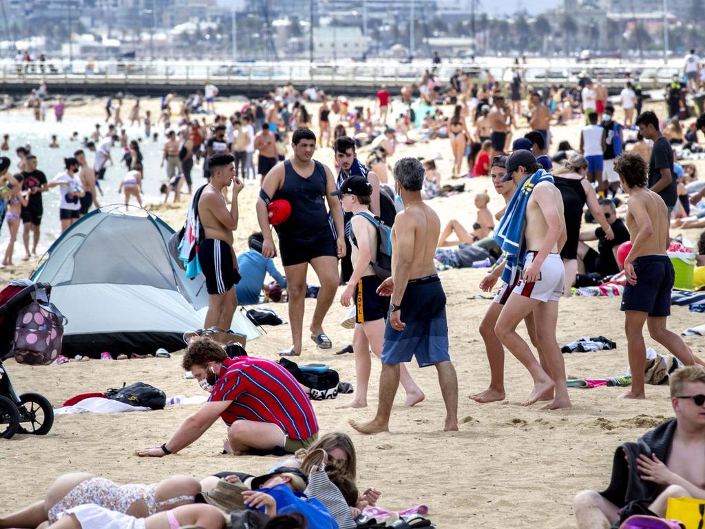 A crowded St Kilda beach on November 15. Temperatures hit 30 degrees just as Covid restrictions eased. Picture: NCA NewsWire / David Geraghty