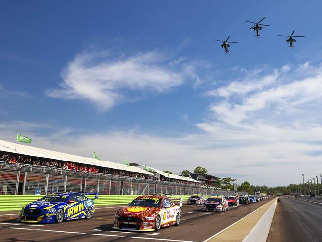 The Supercars line up before the start of the first race of the Darwin Triple Crown weekend on Saturday. Picture: Mark Horsburgh