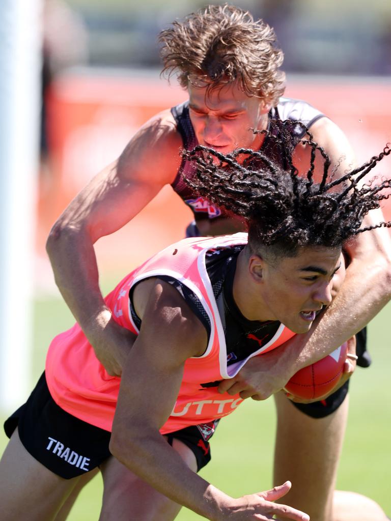 Isaac Kako powers through a tackle. Picture: Mark Stewart