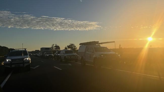 The traffic lined up on the Bruce Highway after a crash on Friday involving seven cars and two trucks.