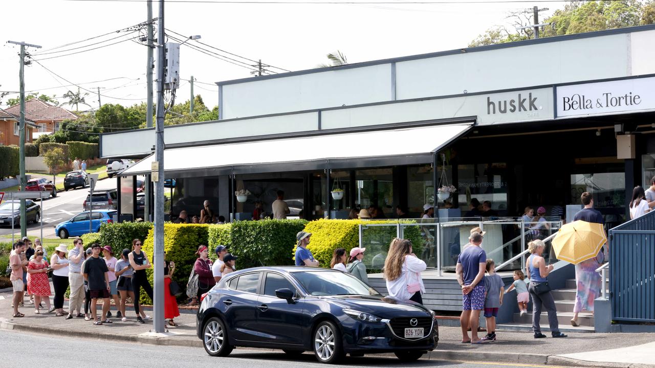 People line up at Bella and Tortie on its last day. Picture: Steve Pohlner