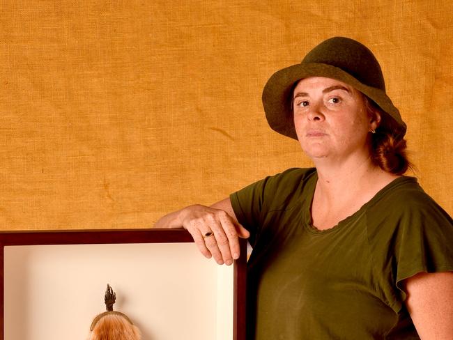 Kangaroo Island artist Lara Tilbrook with her artwork “Fat Cat”. Photo Sam Wundke / AAP Photo.