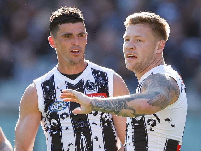 MELBOURNE, AUSTRALIA - MAY 18: Jordan De Goey of the Magpies celebrates a goal with teammate Scott Pendlebury during the 2024 AFL Round 10 match between The Collingwood Magpies and Kuwarna (Adelaide Crows) at The Melbourne Cricket Ground on May 18, 2024 in Melbourne, Australia. (Photo by Dylan Burns/AFL Photos via Getty Images)